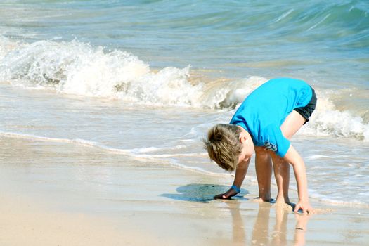 young boy on the beach