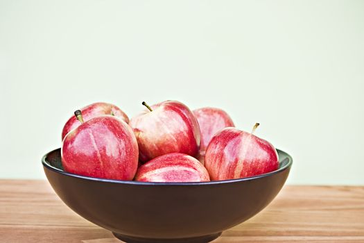 Red gala apples in a bowl

