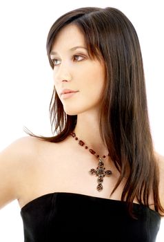 portrait of lovely brunette with crucifix over white