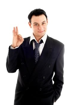 friendly businessman showing ok sign over white