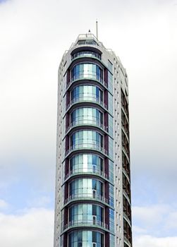 Picture of a modern high building touching the skies