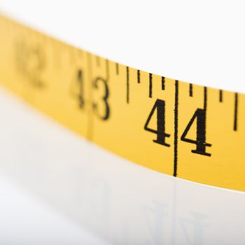 Selective focus of measuring tape.