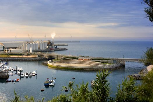 image of a industry near the dock in the sea