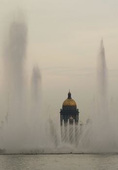 Russia.Summer.Saint Petersburg.Isakievsky cathedral behind fountains