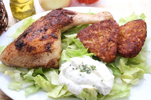 a meal of chicken and salad