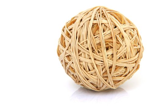 ball made of rubber bands isolated on white background with small reflection