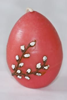 closeup of a pink egg shaped candle