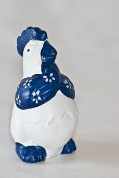 cute little porcelain cock as easter decoration