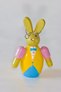 cute little wooden easter bunny with glasses