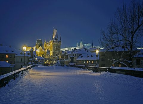 Winter night view from Charles bridge to castle - Prague