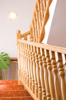 Staircase in a house with wooden balusters.