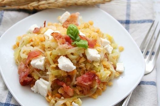 fresh salad of red lentils with leak and ham