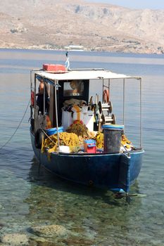weird fishing boat by the shore leros island dodecanese greece