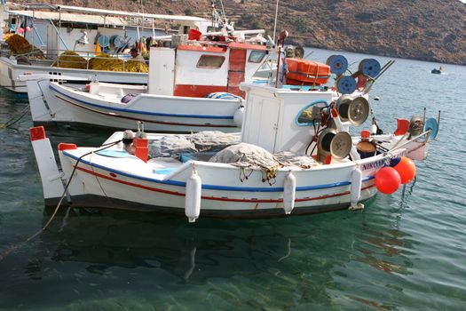 fishing boats moored at patmos island greece