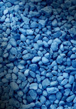 Smooth blue decorative stone background. Vertical