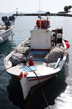 fishing boats moored at patmos island greece