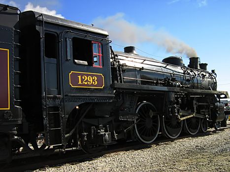 A photograph of an old steam locomotive.