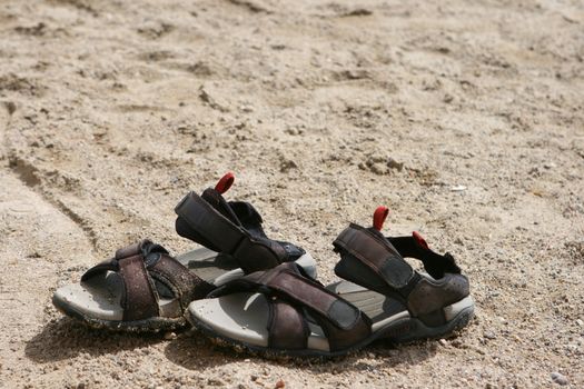 beach shoes on sand horizontal