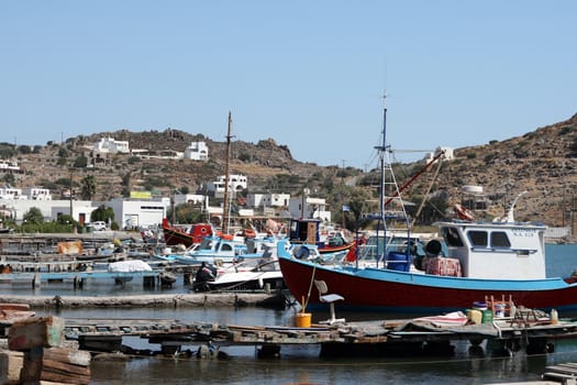 fishing boats mooring at the port of skala patmos island dodecanese greece