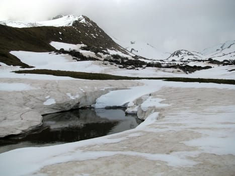 Lake; water; a relief; a landscape