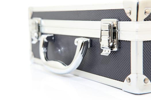 closeup black aluminum briefcase isolated on white background