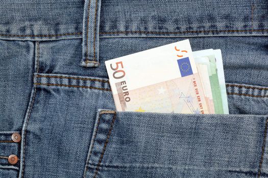 blue jean and fifty euro banknotes