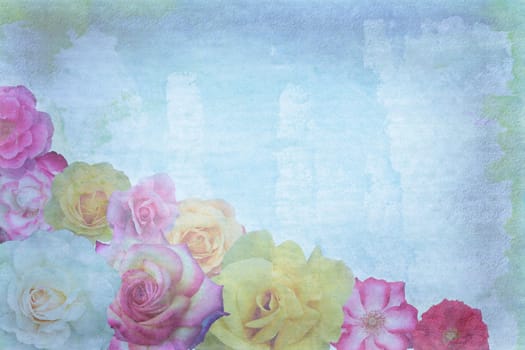 Roses on grunge background with blue tint