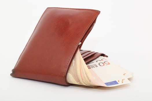 brown leather wallet with fifty euro banknotes isolated
