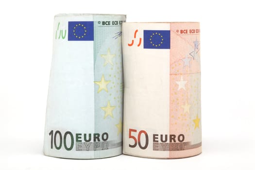 closeup rolled euro banknotes fifty and hundred isolated on white