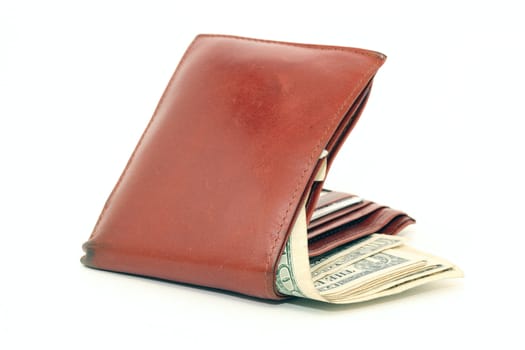 brown leather wallet with american dollar banknotes isolated