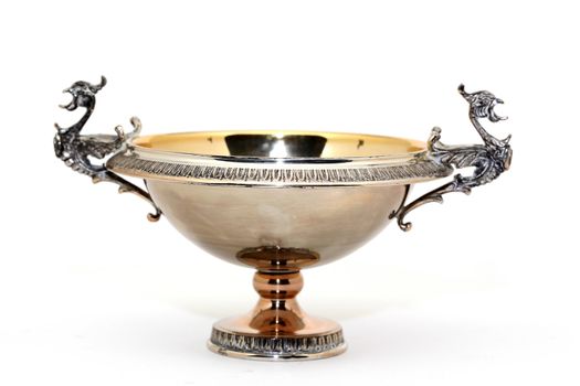 antique decorational silver cup isolated on white background