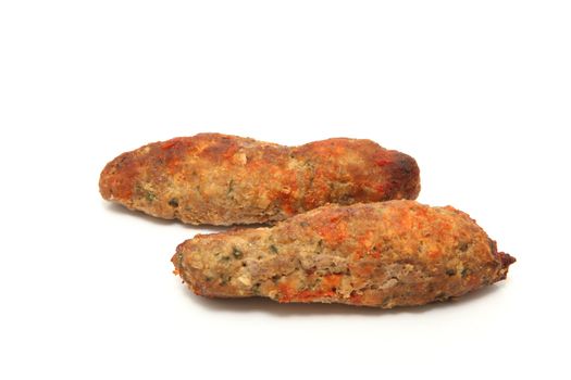 two kebab stakes isolated on white background