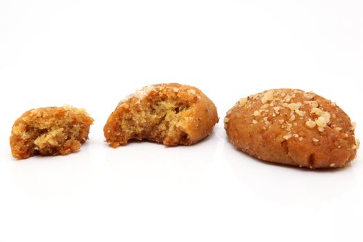 two traditional Greek Christmas sweets called melomakarona or phoenikia. A honey-dipped cookie, with wallnuts on top