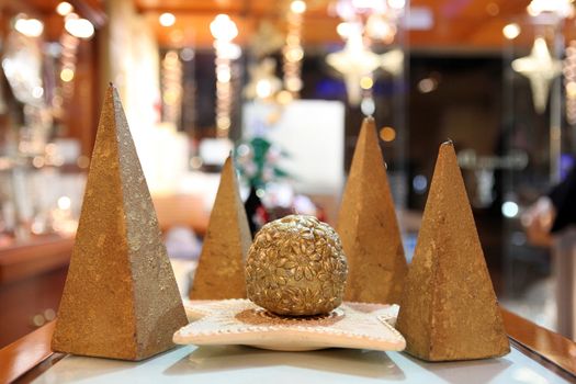 lights and golden xmas decoration candles with soft blur background