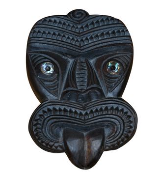 Maori Wood Carved Tiki Mask isolated with clipping path