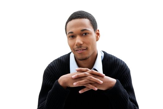 Handsome African American male in blue shirt and black sweater, isolated