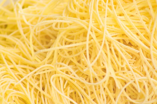 Close up of freshly made raw noodles.