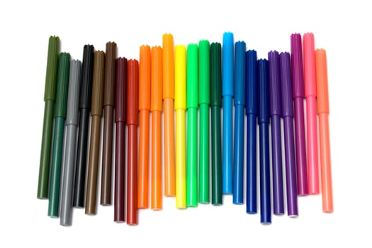 Colored felt tip pens in a row on white background.