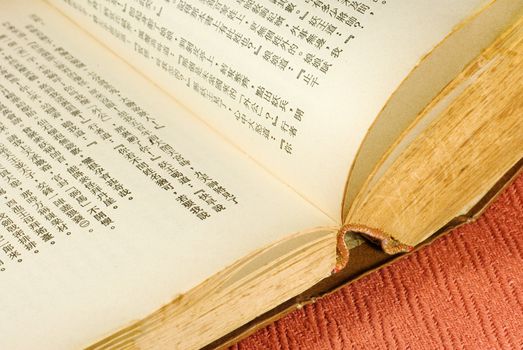 It is a Chinese book opened. You can look at that words so clear.