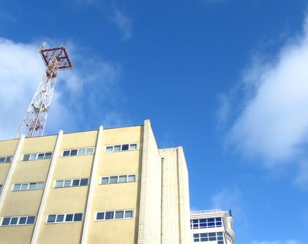 exchange and antenna on blue sky  with clouds background