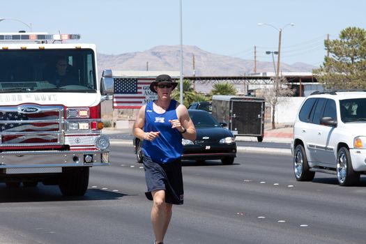 Tour of Duty Bradley Iverson (Las Vegas Firefighter) running in las vegas on Nellis BLVD. on Aug. 15th 2010