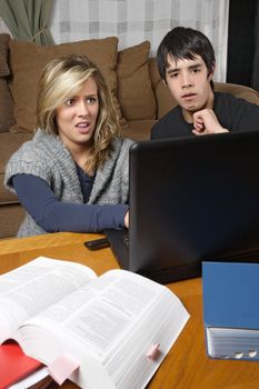 Two students doing homework come across something bad while browsing the internet.