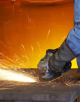 a close up picture of sparks on a grinding wheel