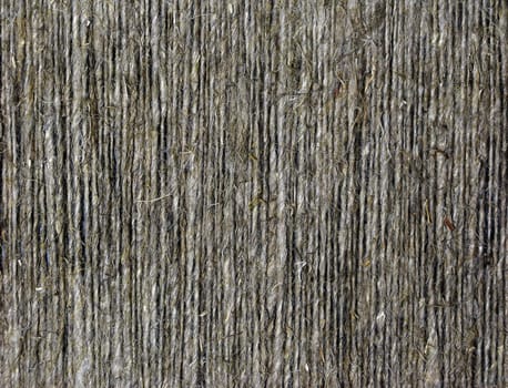 Fragment of vertical rough string background texture