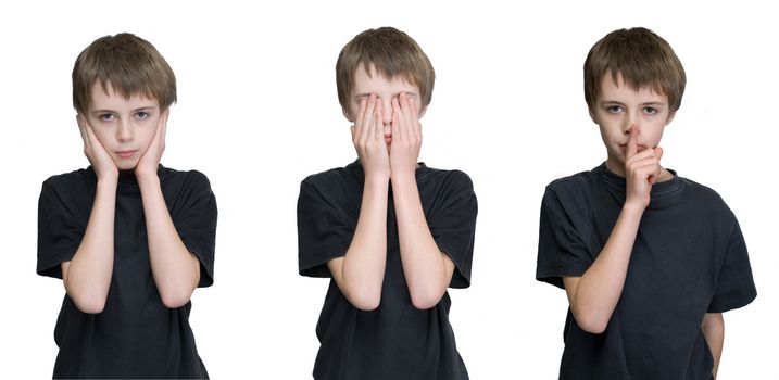 a young male child depicting the three wise monkies old saying hear, see and speak no evil. 