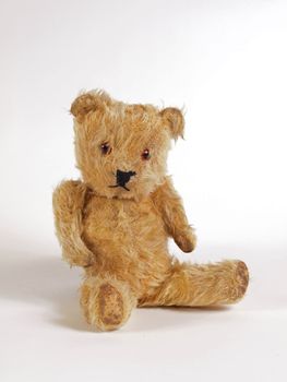 1950 teddy bear on a plain white background.