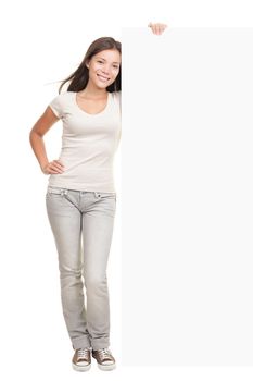 Woman showing billboard banner - white and blank with copy space. Caucasian asian model isolated on white background in full length.