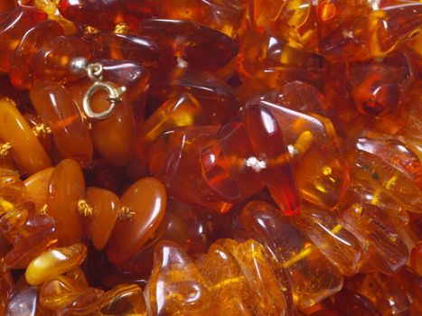 detail of amber beads on off- close up