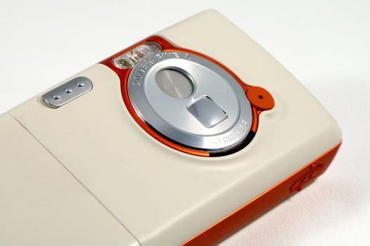 The camera of modern mobile phone over white