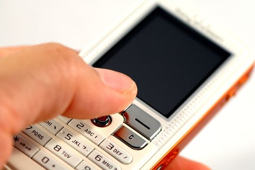 Dialing a modern mobile phone over white